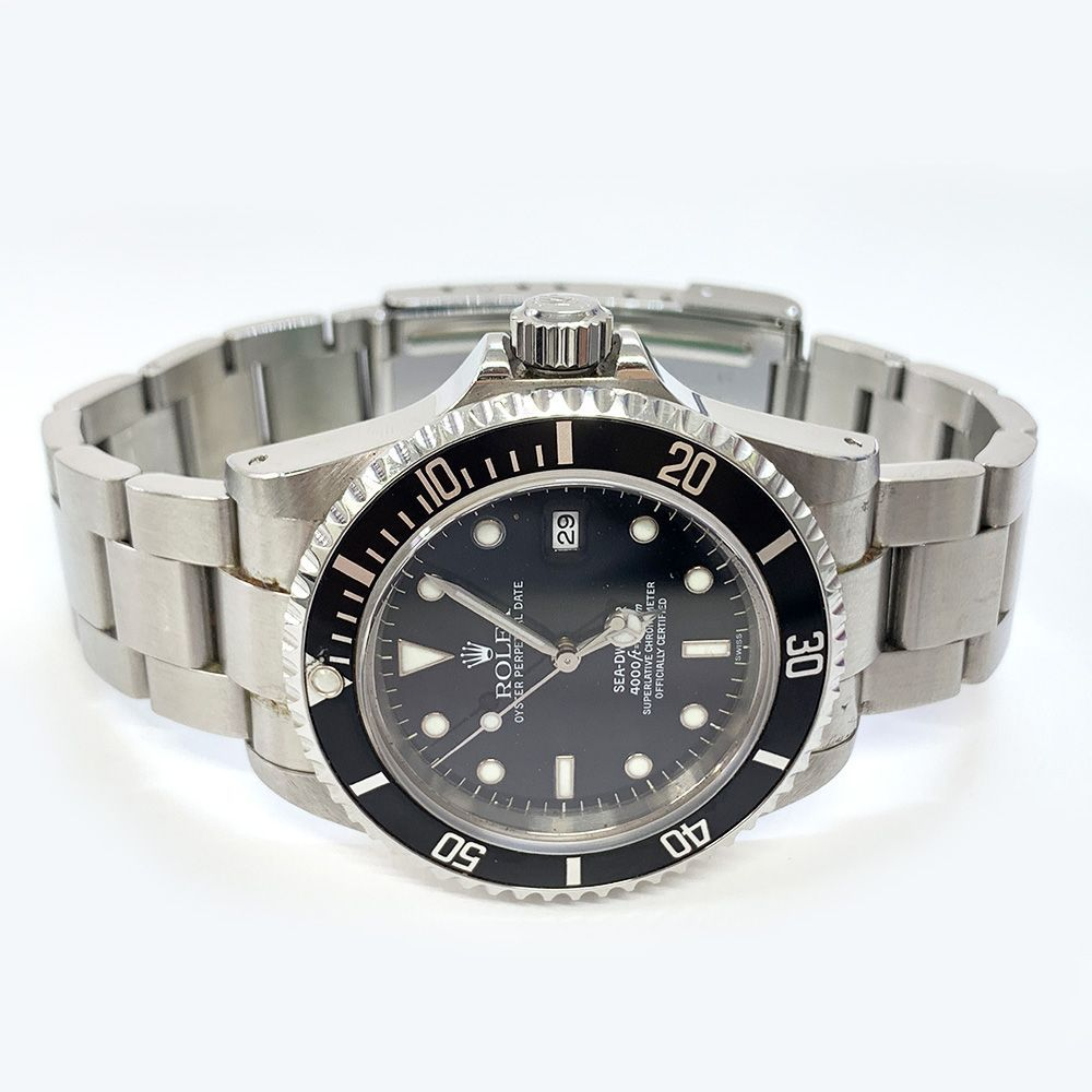 Rolex SeaDweller Black Dial on Oyster Ref 16600 with Papers 1999